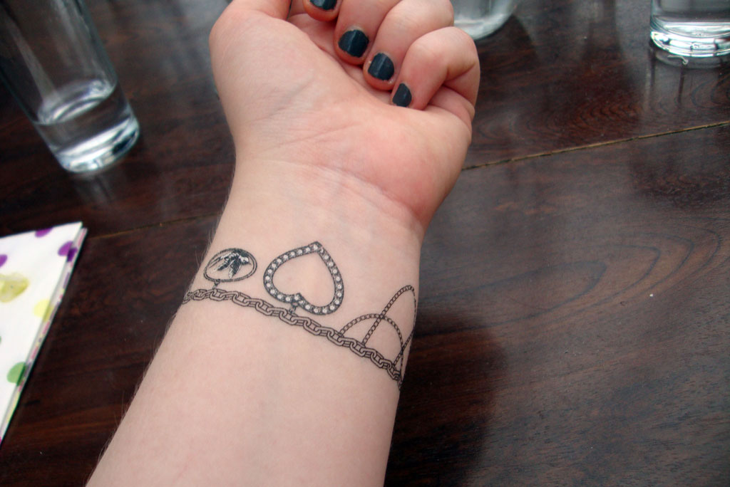 Bracelet tattoo design on wrist