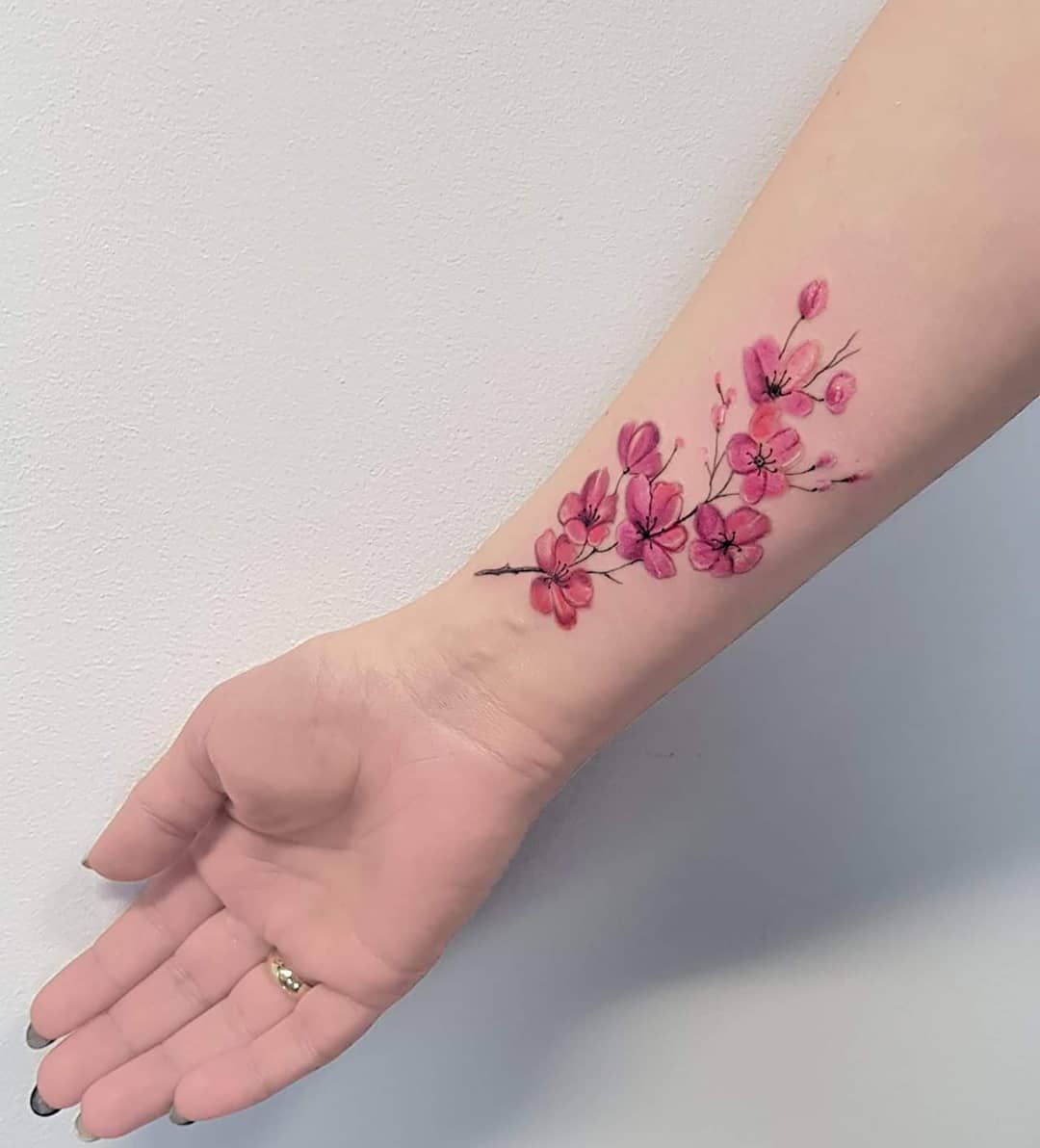 Flower tattoo design on wrist