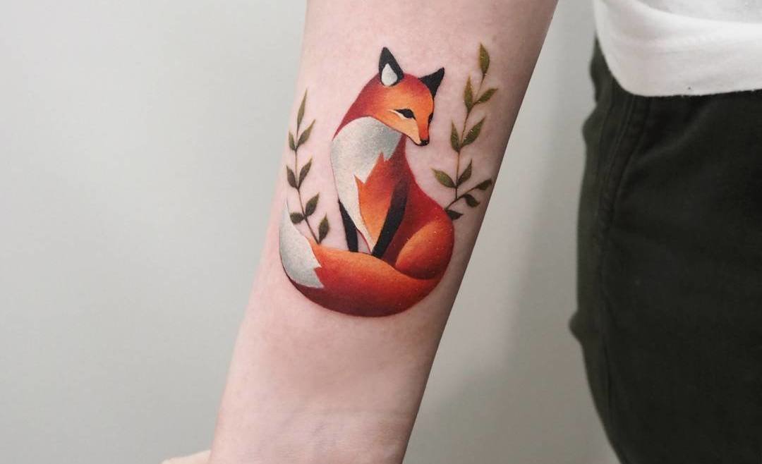 Tiny fox design tattoo on hand and wrist