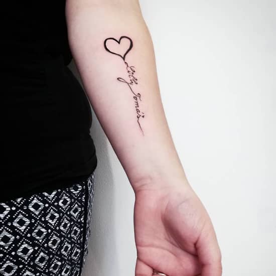 Words tattoo designs on wrist and hand