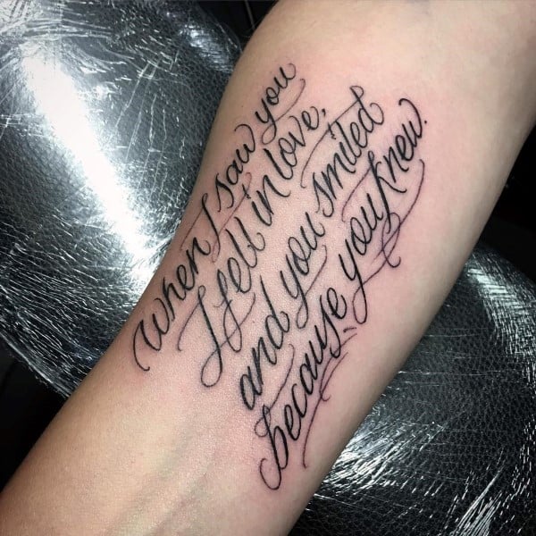 Forearm quote tattoo